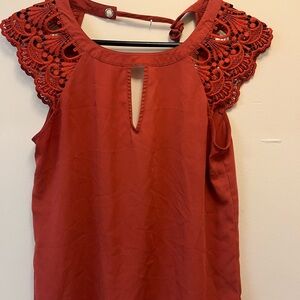 Elegant Red Sleeveless Top with Lace Detail